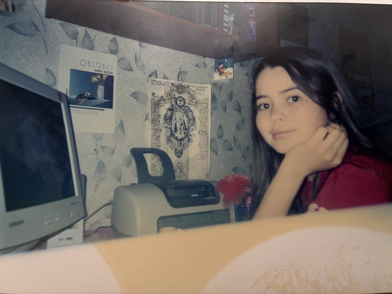 Portrait of Ella Musaieva as a child at her first computer